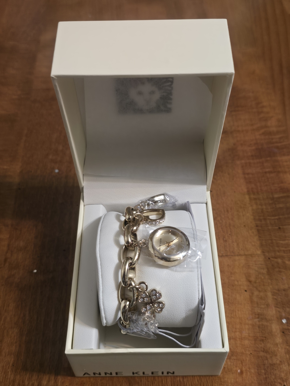 Anne Klein Gold Charm Bracelet Watch with Crystal Charms